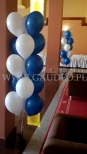 Balony z helem ułożone w stroiki.