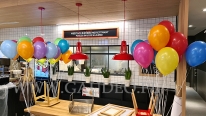 Kolorowe balony z helem Września KFC.